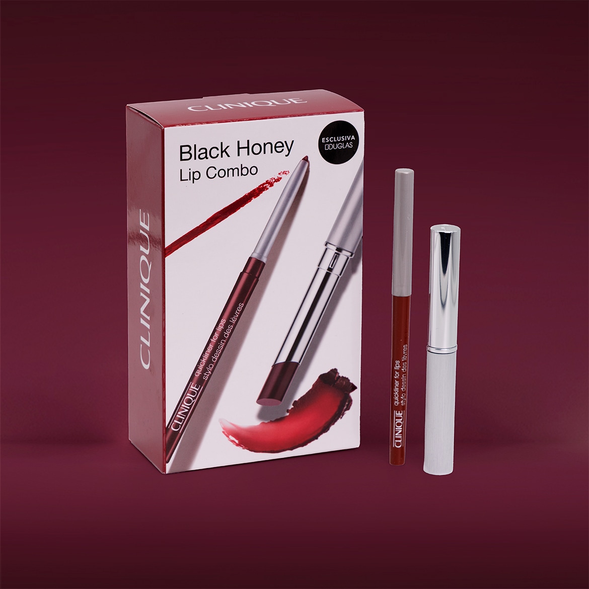 Il set Clinique Black Honey Lip Combo, esclusiva Douglas, include una matita labbra marrone scuro e un rossetto liquido in un elegante cofanetto bianco con dettagli rossi.