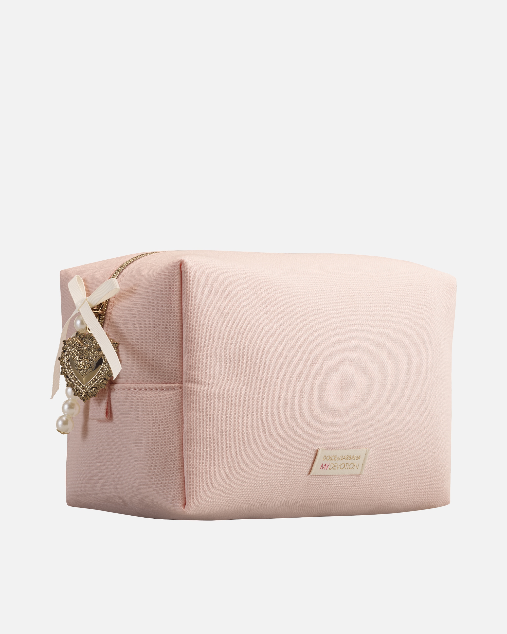 ESCLUSIVA DOUGLAS Pouch in omaggio all’acquisto di una fragranza Devotion by Dolce&Gabbana da almeno 50 ml. Esclusi i prodotti Douglas Partner.
