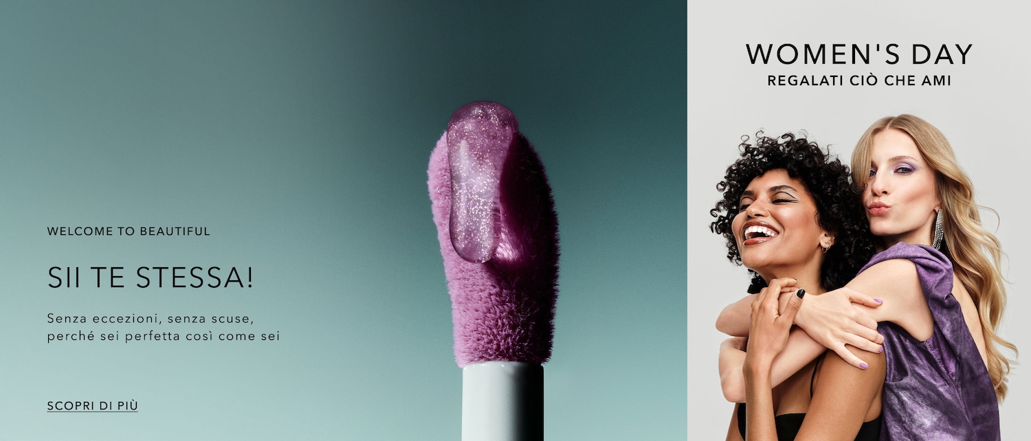 Festeggia la Festa della Donna con un tocco di bellezza: un primo piano di un applicatore di lucidalabbra viola con una goccia scintillante, accompagnato dal messaggio “Sii te stessa!”. Scopri di più e regalati ciò che ami.