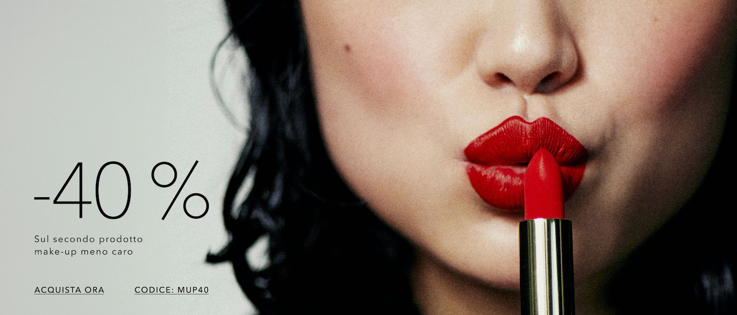 Close-up of a woman applying red lipstick, with a promotional offer of -40% on the second make-up product, use code MUP40, shop now!