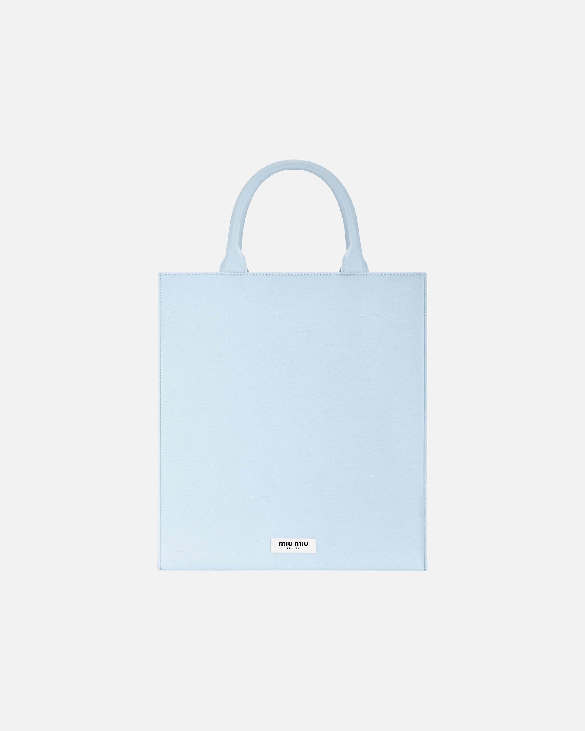 ESCLUSIVA APP DOUGLAS Tote bag in omaggio all'acquisto di una fragranza MIU MIU da APP. Esclusi i prodotti Douglas Partner.