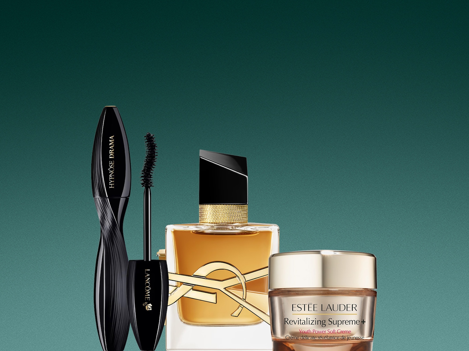 Ecco un mascara Lancôme Hypnôse Drama nero, un profumo Yves Saint Laurent dorato e una crema Estée Lauder Revitalizing Supreme+ color pesca.