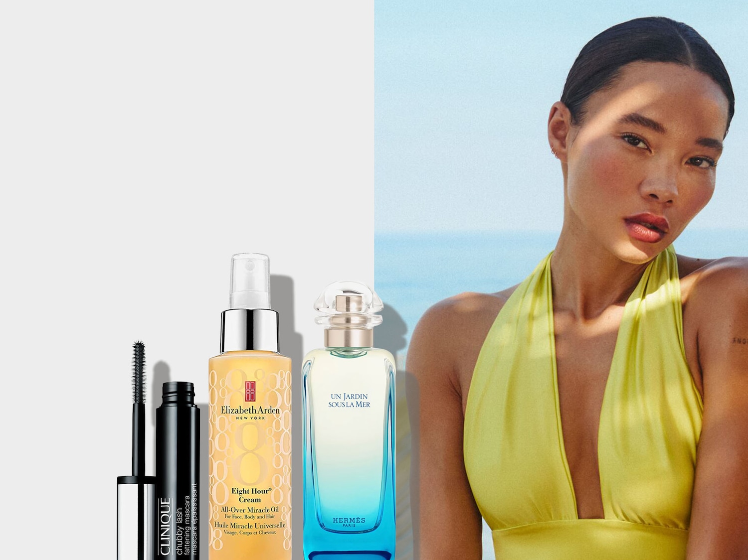 Clinique chubby lash mascara nera, Elizabeth Arden Eight Hour Cream All-Over Miracle Oil in flacone arancione e profumo Hermes Un Jardin Sous la Mer, con note fresche e marine.