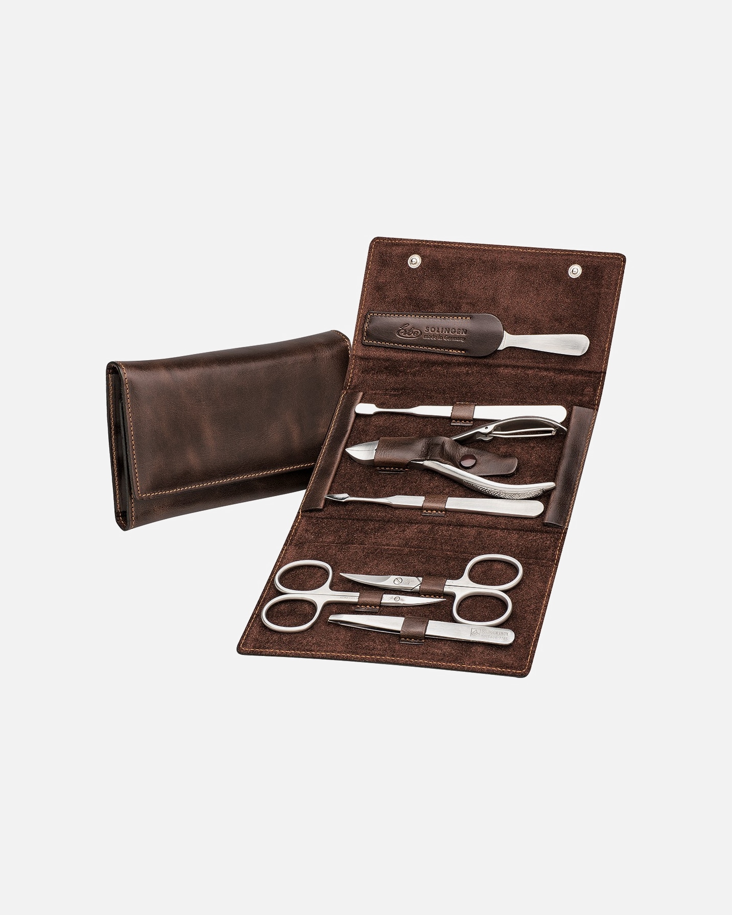 Astuccio di Unisex ERBE Manicure Snap Button Case Range "Antik", brown, 7 pcs. Manicure Snap Button Case Range "Antik", brown, 7 pcs.